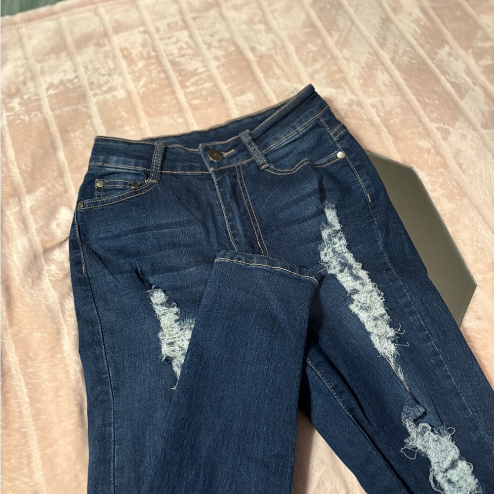 High Rise Blue Distressed Jeans with Contrast Stitching